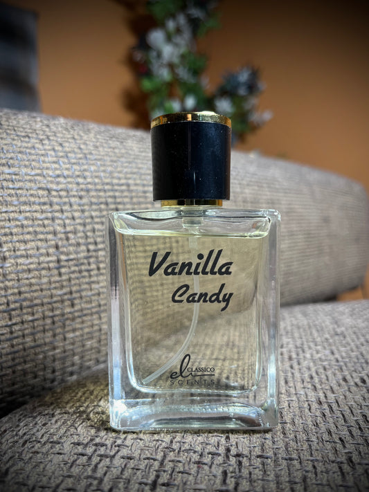 Perfume bottle labeled 'Vanilla Candy' on a textured surface with a blurred background