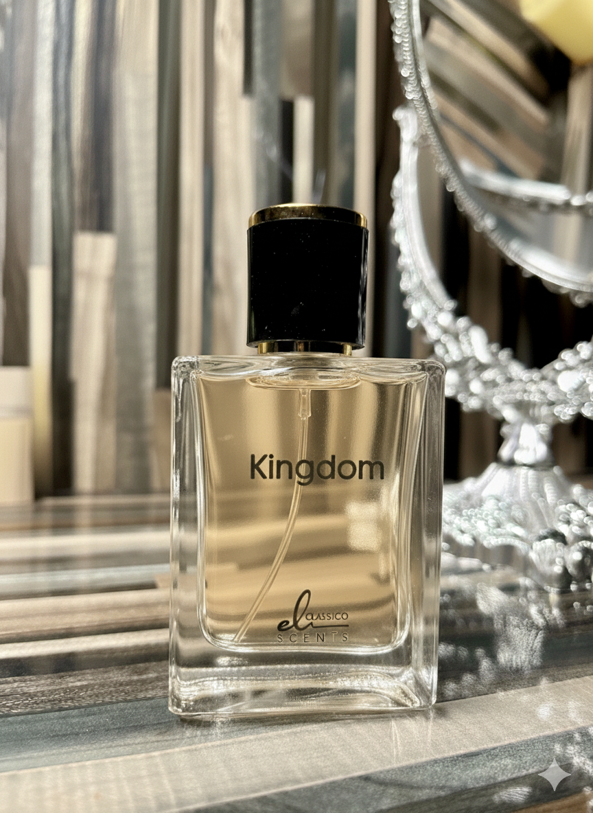 Perfume bottle labeled 'Kingdom' on a reflective surface with decorative elements.