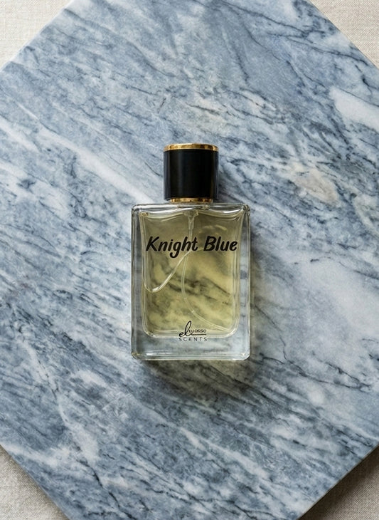 Perfume bottle labeled 'Knight Blue' on a marble surface