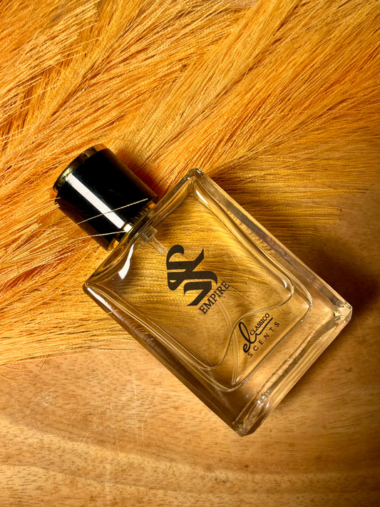 Perfume bottle with a black cap on a wooden surface